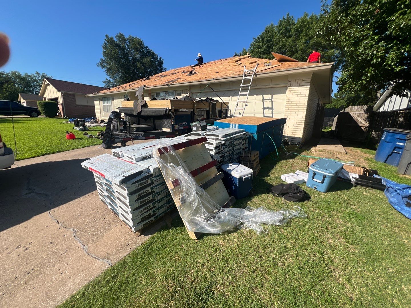 Roofing Crew replacing a residential roof